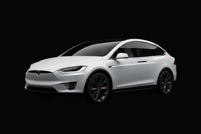 Tesla Model X white on black background from the front sideways